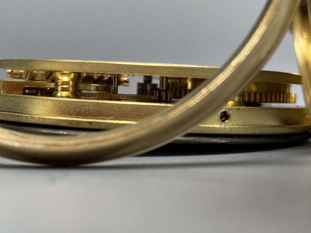 An Edwardian 18ct gold open face keywind lever pocket watch, the case back with engraved monogram,